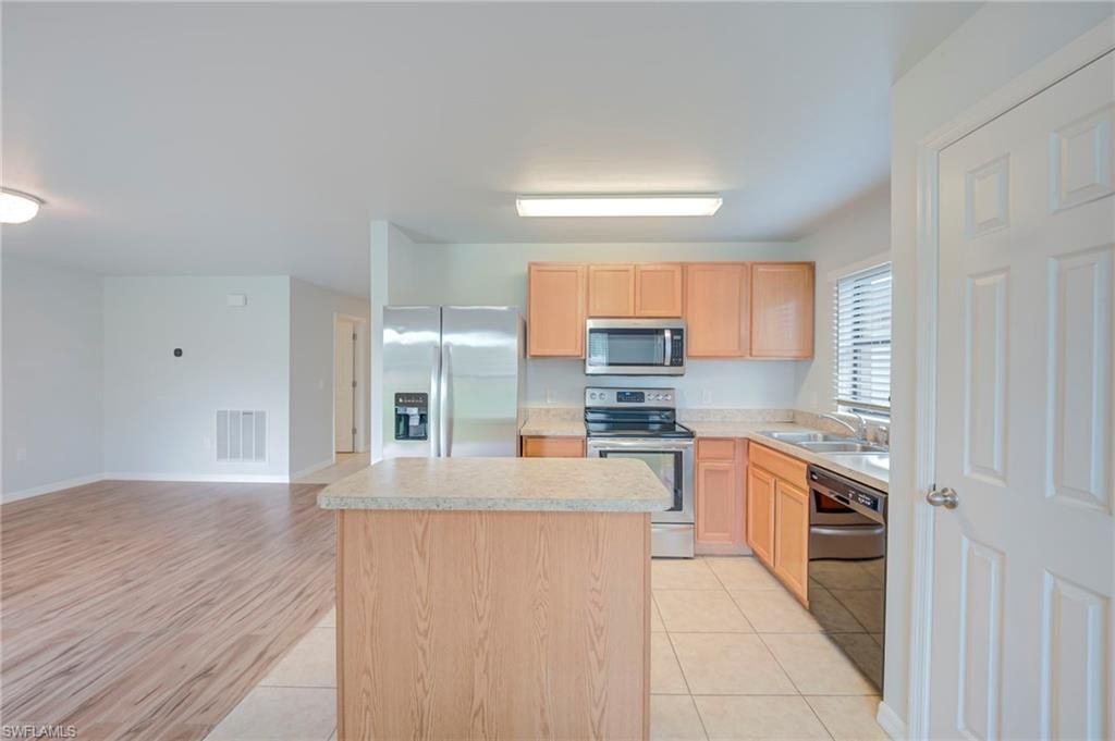 313 Shadow Lakes Dr , Lehigh Acres, FL 33974 Photo