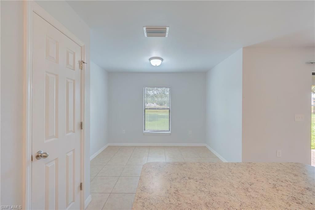 313 Shadow Lakes Dr , Lehigh Acres, FL 33974 Photo