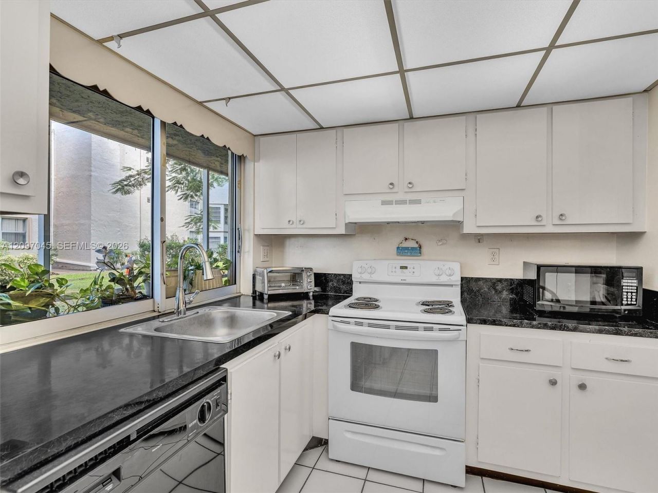 9360 Lime Bay Blvd , Unit 105, Tamarac, FL 33321 Photo