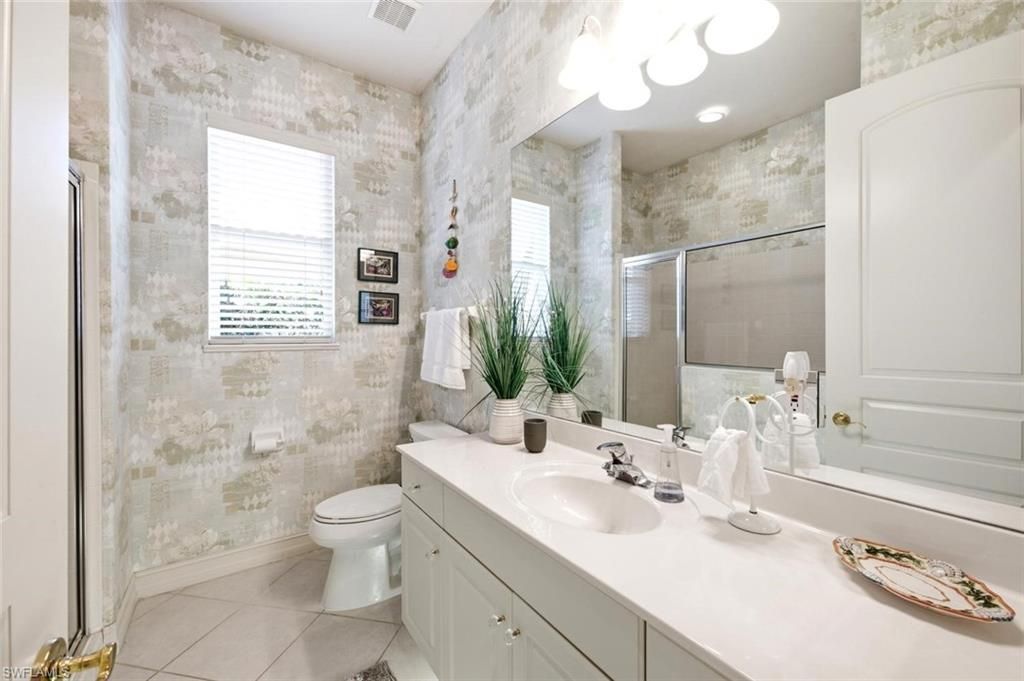 5872 Whisperwood Ct, Naples, FL 34110 Photo