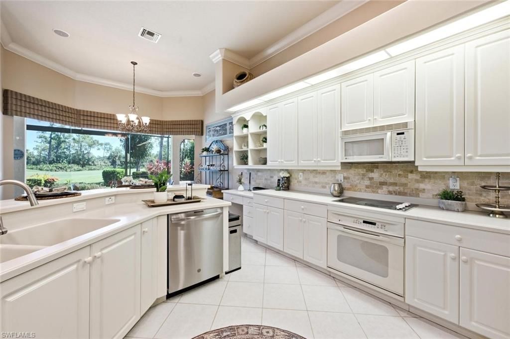 5872 Whisperwood Ct, Naples, FL 34110 Photo