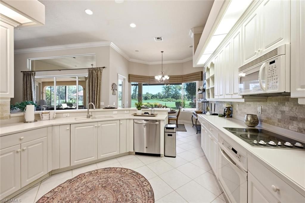 5872 Whisperwood Ct, Naples, FL 34110 Photo