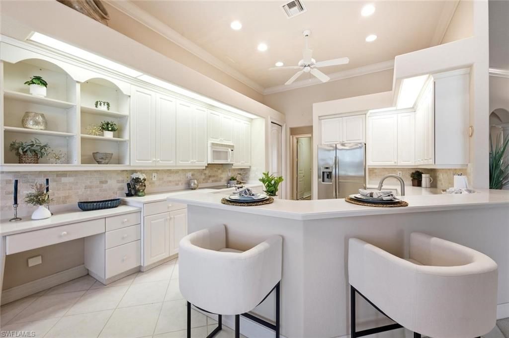 5872 Whisperwood Ct, Naples, FL 34110 Photo
