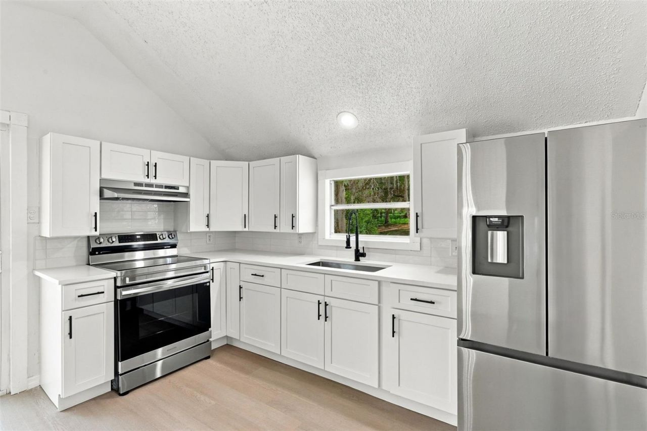 41520 Charm Lake Drive, Umatilla, FL 32784 Photo