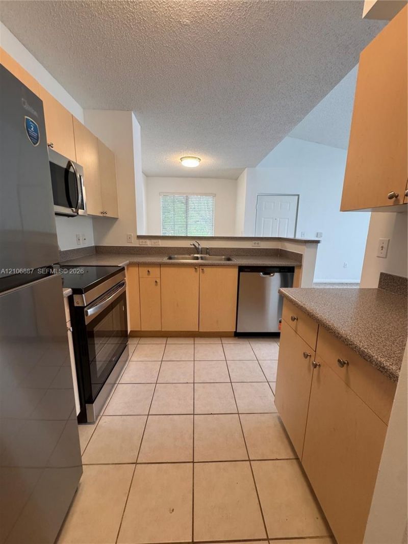 7950 N Nob Hill Rd , Unit 202, Tamarac, FL 33321 Photo