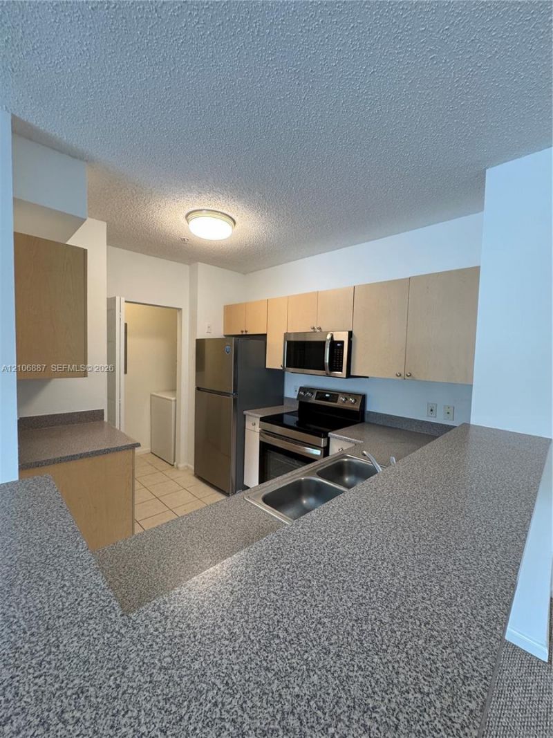 7950 N Nob Hill Rd , Unit 202, Tamarac, FL 33321 Photo