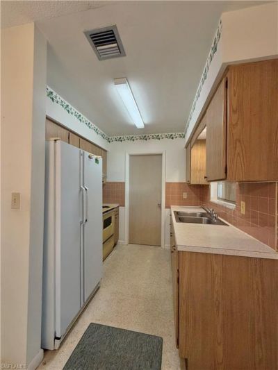 1419 Kimdale St E, Lehigh Acres, FL 33936 Photo