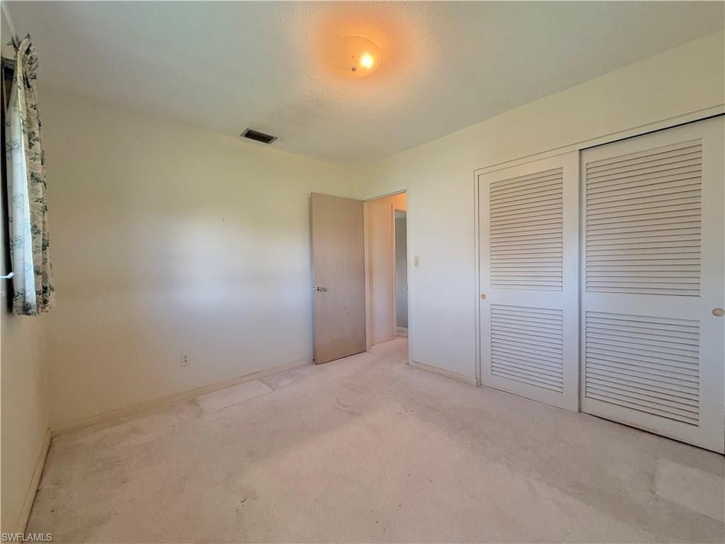 1419 Kimdale St E, Lehigh Acres, FL 33936 Photo