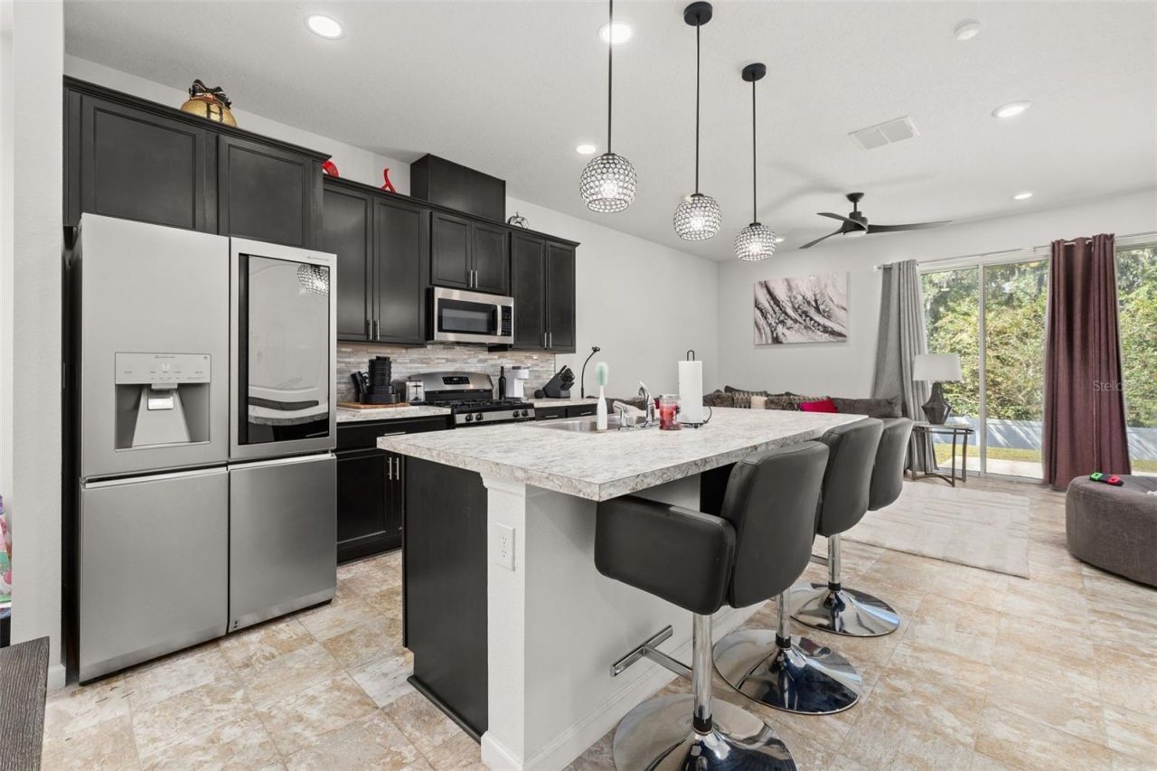 5240 Meadow Song Drive , Okahumpka, FL 34762 Photo