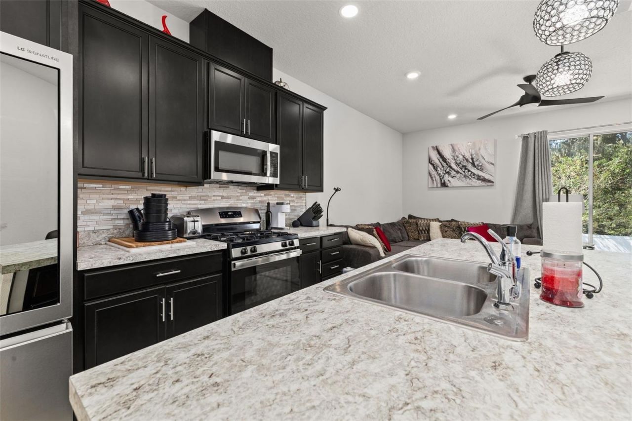 5240 Meadow Song Drive , Okahumpka, FL 34762 Photo