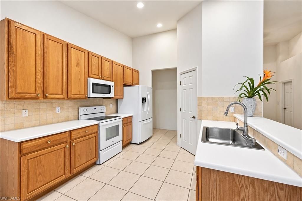 3899 Aurora Ct , Naples, FL 34116 Photo
