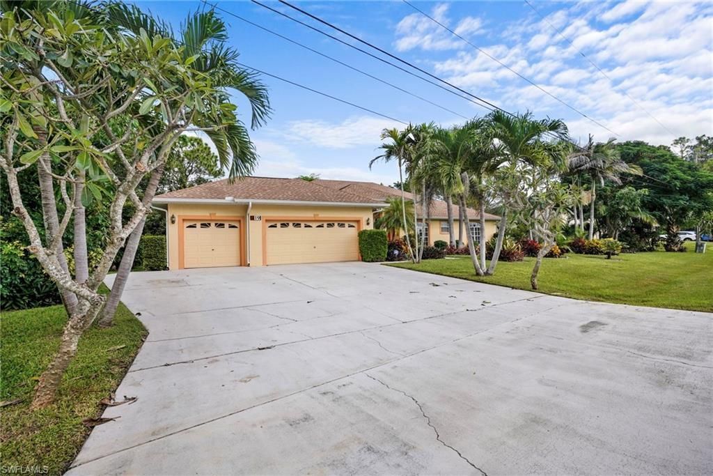 619 Parkdale Blvd , Lehigh Acres, FL 33974 Photo