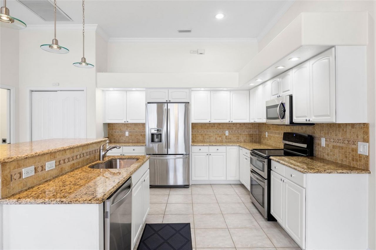 12009 Brewster Drive , Tampa, FL 33626 Photo