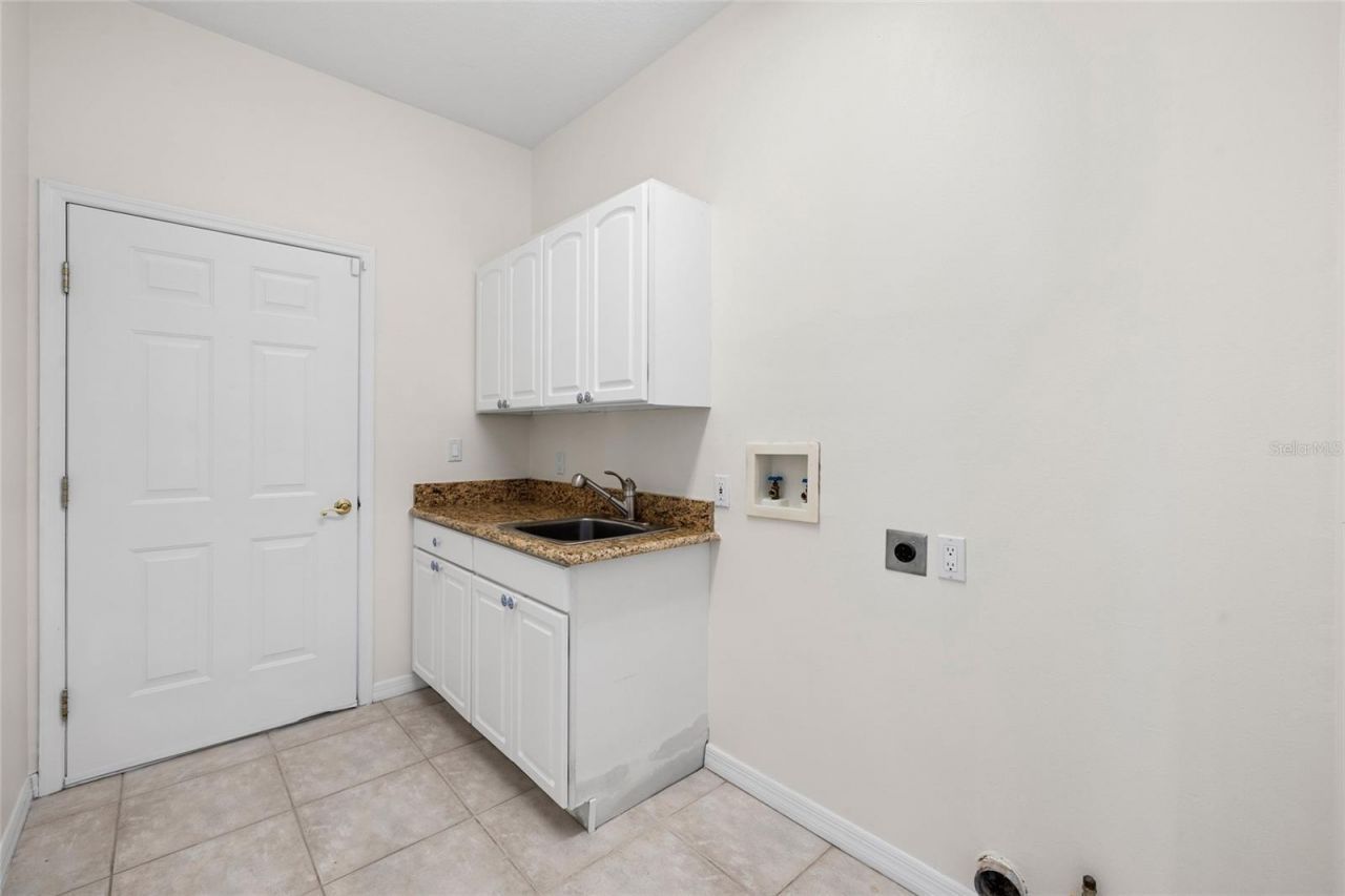 12009 Brewster Drive , Tampa, FL 33626 Photo