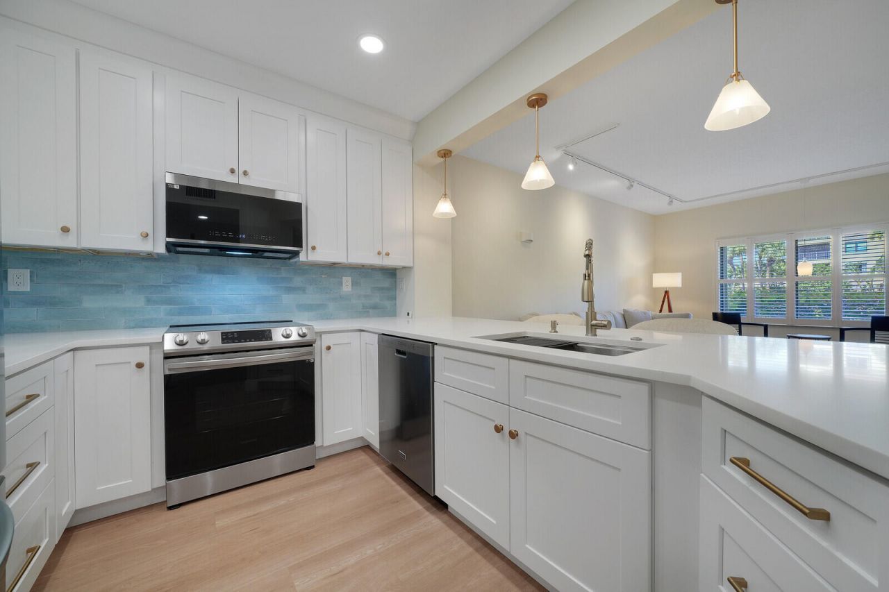 400 Uno Lago Drive, Unit 103, Juno Beach, FL 33408 Photo