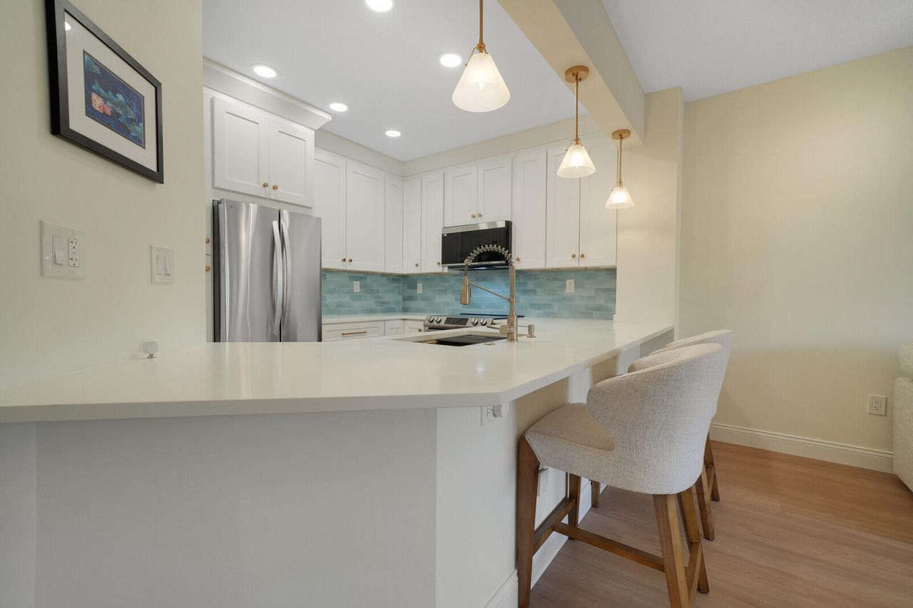 400 Uno Lago Drive, Unit 103, Juno Beach, FL 33408 Photo