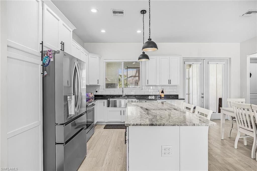 1305 NW 10th Ter, Cape Coral, FL 33993 Photo