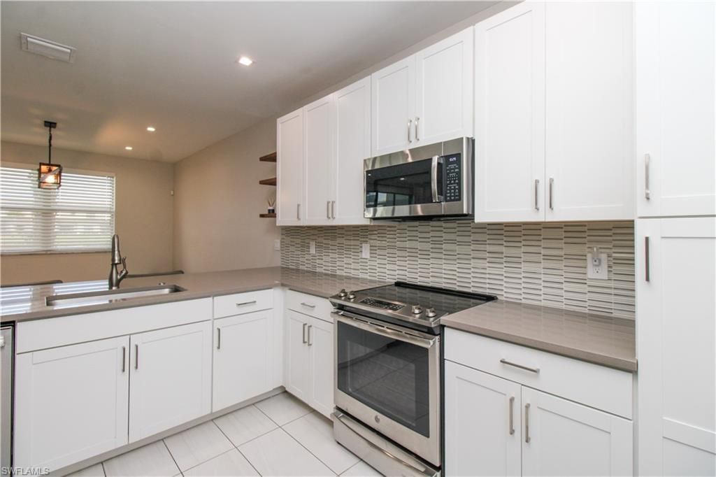 7421 Rockefeller Dr , Naples, FL 34119 Photo