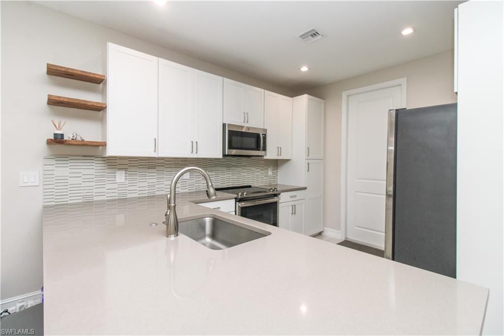7421 Rockefeller Dr , Naples, FL 34119 Photo