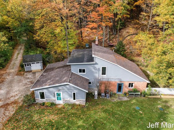 1413 Grand River Drive NE, Ada, MI 49301