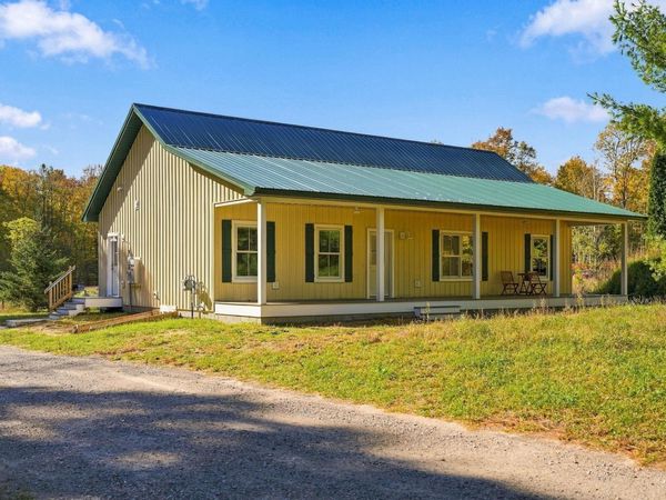 237 Century Road W, Maple City, MI 49664