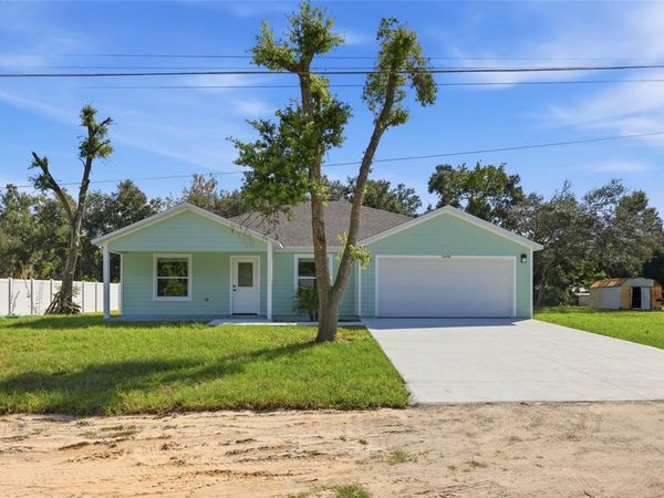 11134 WOODSIDE DRIVE , LEESBURG, FL 34788