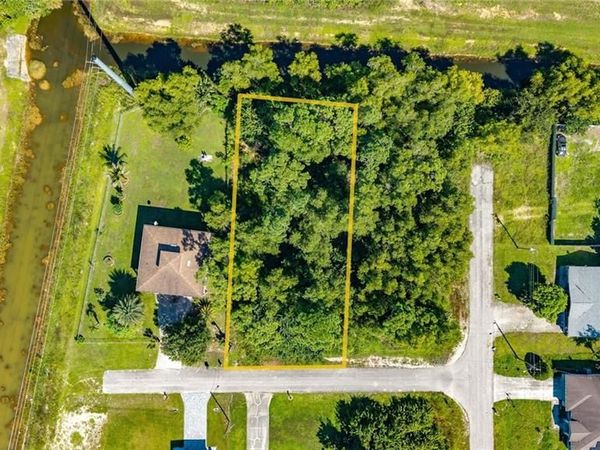 57 Fred AVE S, LEHIGH ACRES, FL 33976