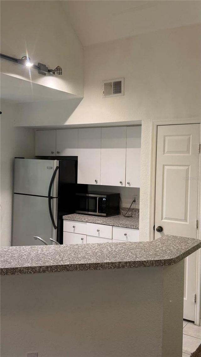 6348 Raleigh Street , Unit 1312, Orlando, FL 32835 Photo