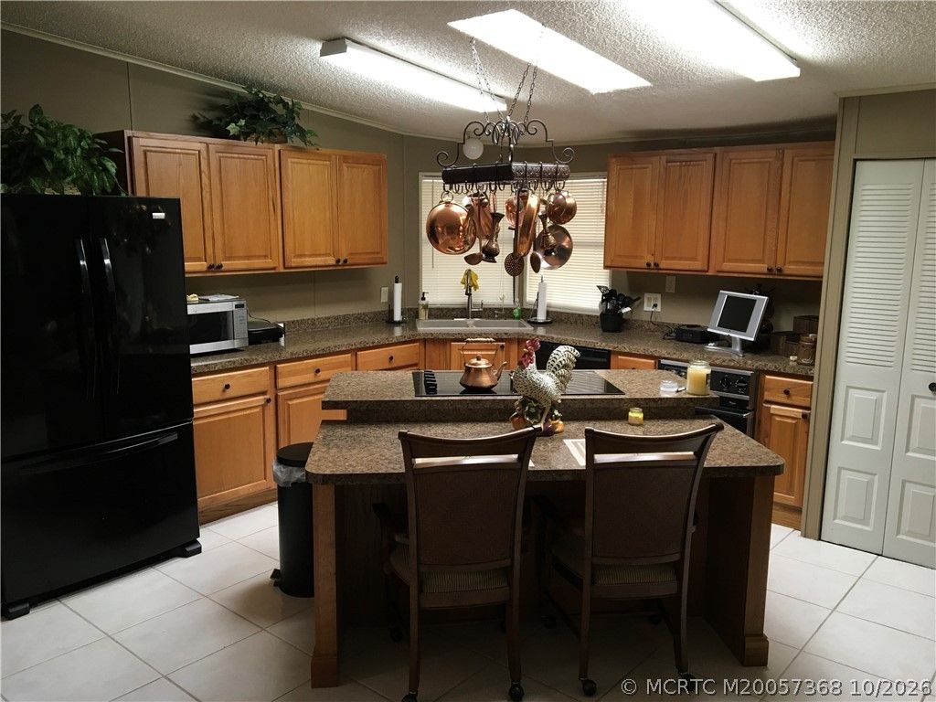 14301 SW Divot Drive , Unit G-33, Indiantown, FL 34956 Photo