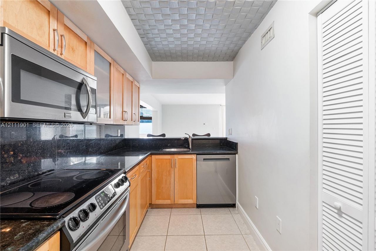 2977 Mcfarlane Rd , Unit 9, Miami, FL 33133 Photo