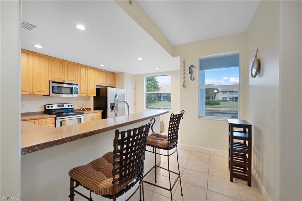 1128 Manor Lake Dr , Unit G103, Naples, FL 34110 Photo