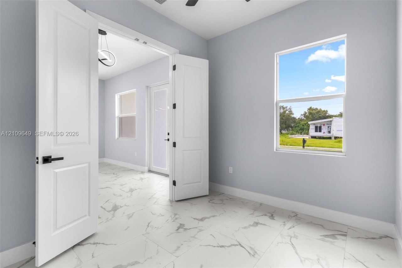 2818 42nd St SW Lehigh Acres, Lehigh Acres, FL 33976 Photo