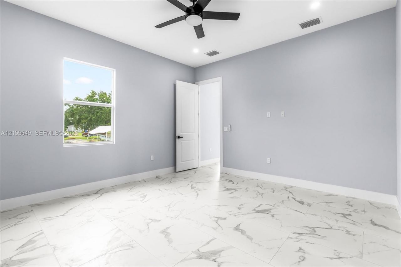 2818 42nd St SW Lehigh Acres, Lehigh Acres, FL 33976 Photo