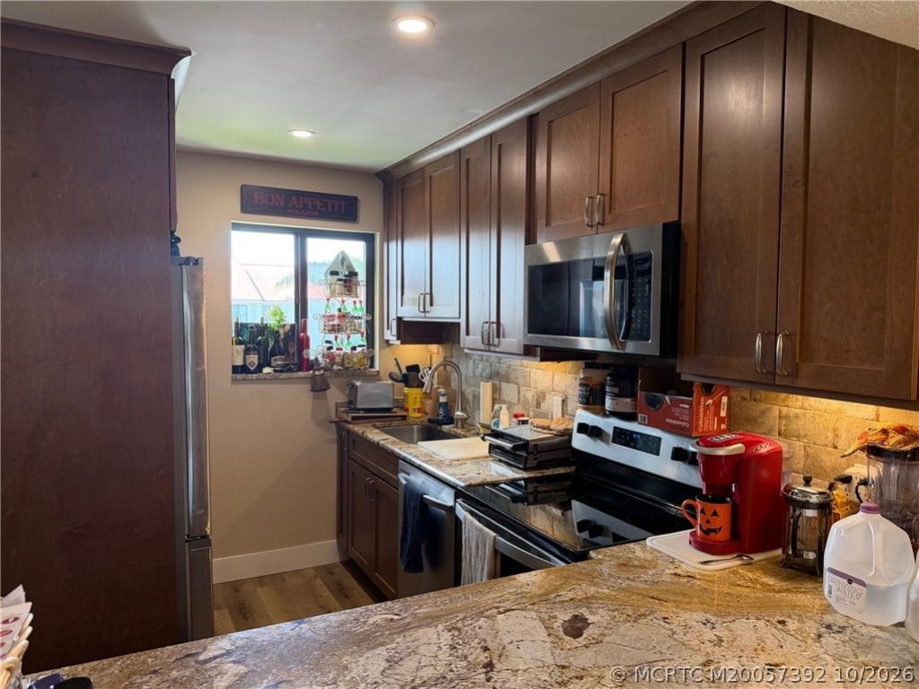 5463 SE Miles Grant Road , Unit B201, Stuart, FL 34997 Photo