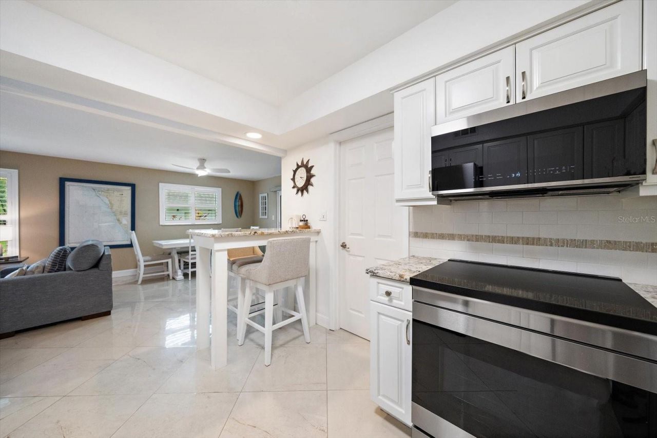 575 Sutton Place , Longboat Key, FL 34228 Photo